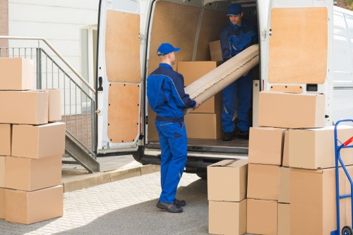 Office relocation planning in Kensington with packed business equipment