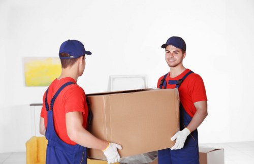 Kensington office relocation team organising boxes and workstations