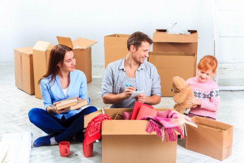Professional movers handling a Kensington apartment relocation