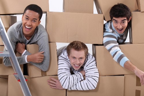 Packed moving boxes inside a Kensington removal van