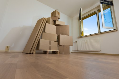 Removal team preparing items for a house move