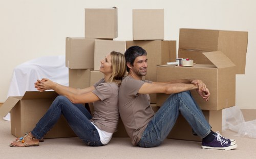 Packed boxes and furniture arranged inside a moving truck