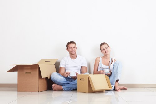 Removal vehicle loading boxes and household items for a Kensington move