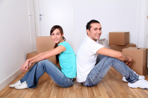 Kensington moving team packing household items for relocation