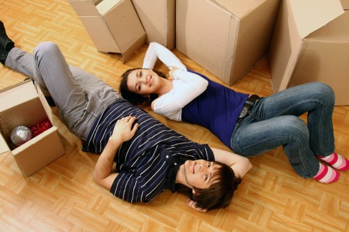 Manager resolving a complaint for a Kensington removals firm