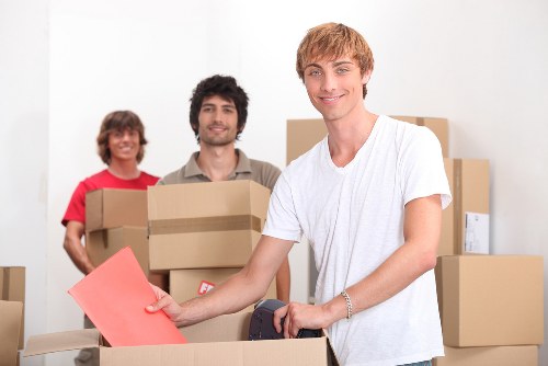 Careful loading of furniture and boxes by a Kensington man with a van service